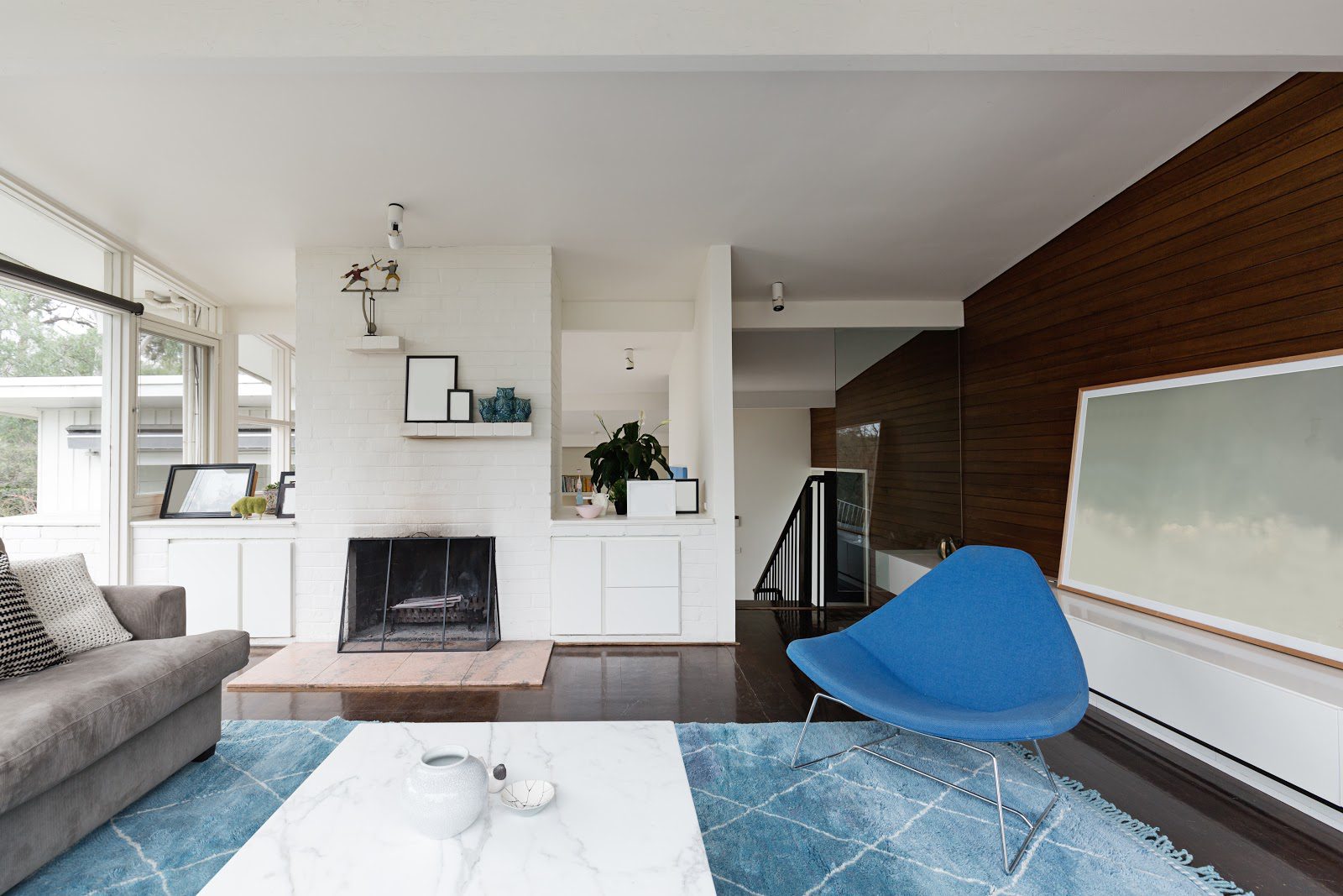 A sleek living room decorated in mid-century modern design