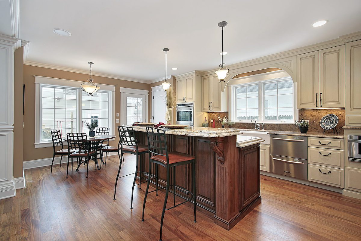 kitchen counter with counter-height bar stools