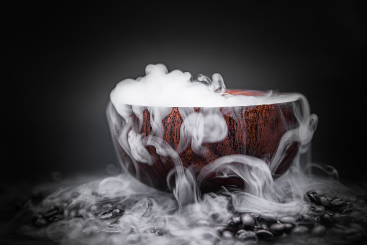 Halloween house decor: dry ice in a wooden bowl