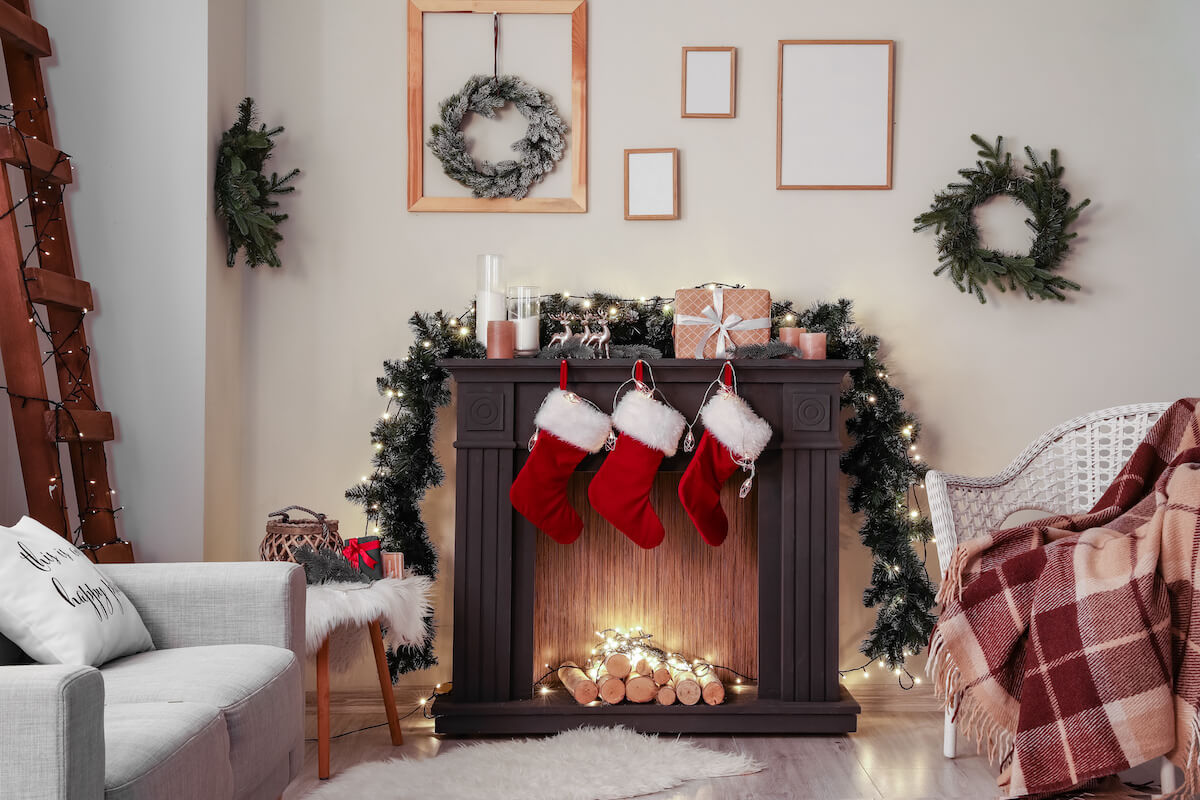 Fireplace with 3 Christmas stockings hanging above it