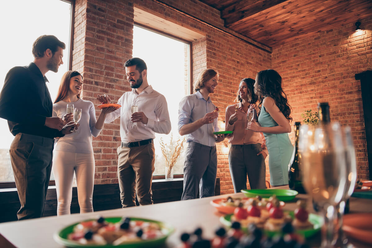 Friends talking at a party