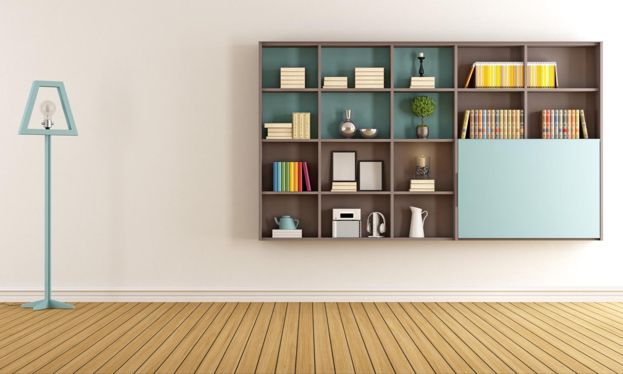 Room with a minimalist bookshelf and a unique lamp in the corner