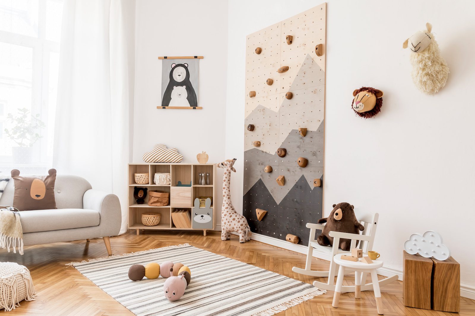 small brown wall with rock climbing holds