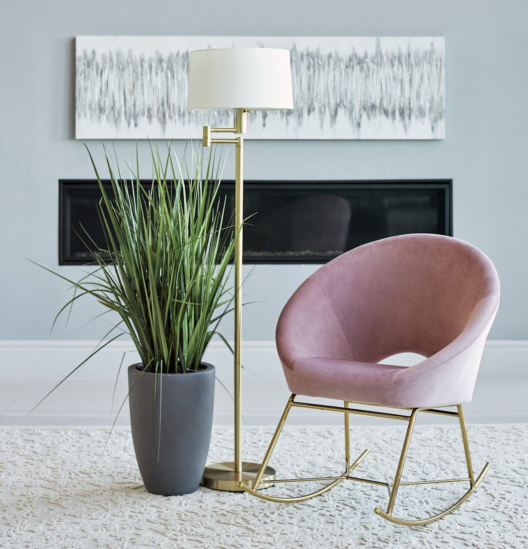 Mid-century modern living room with pink rocking chair