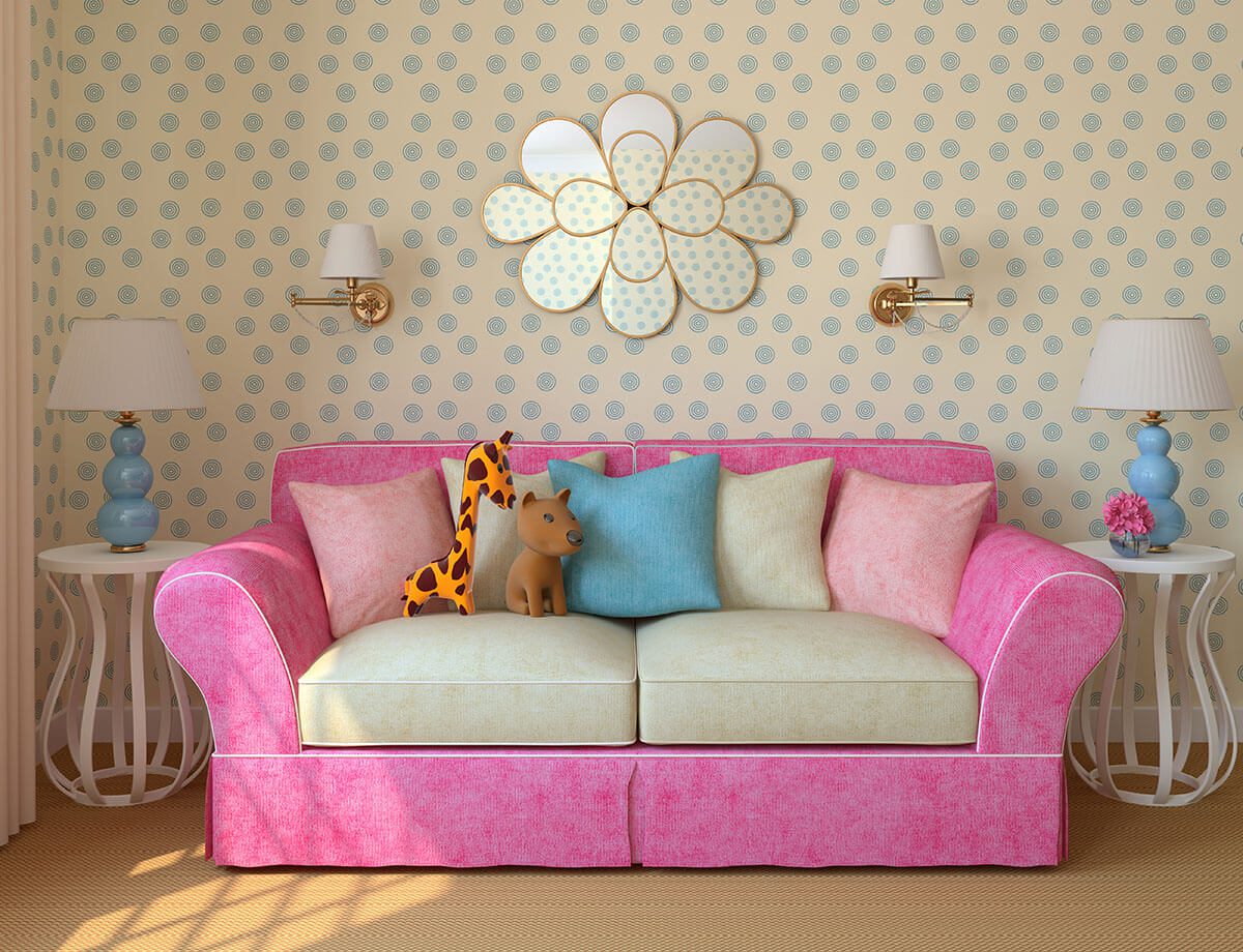 reading nook: Pink sofa with colorful pillows and lampshades