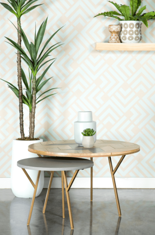round nesting tables in natural and gold